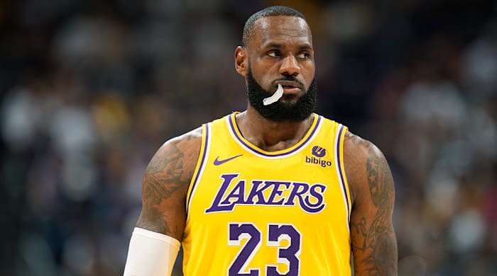 Lakers forward LeBron James looks to the bench during the second half of the team’s game against the Nuggets.
